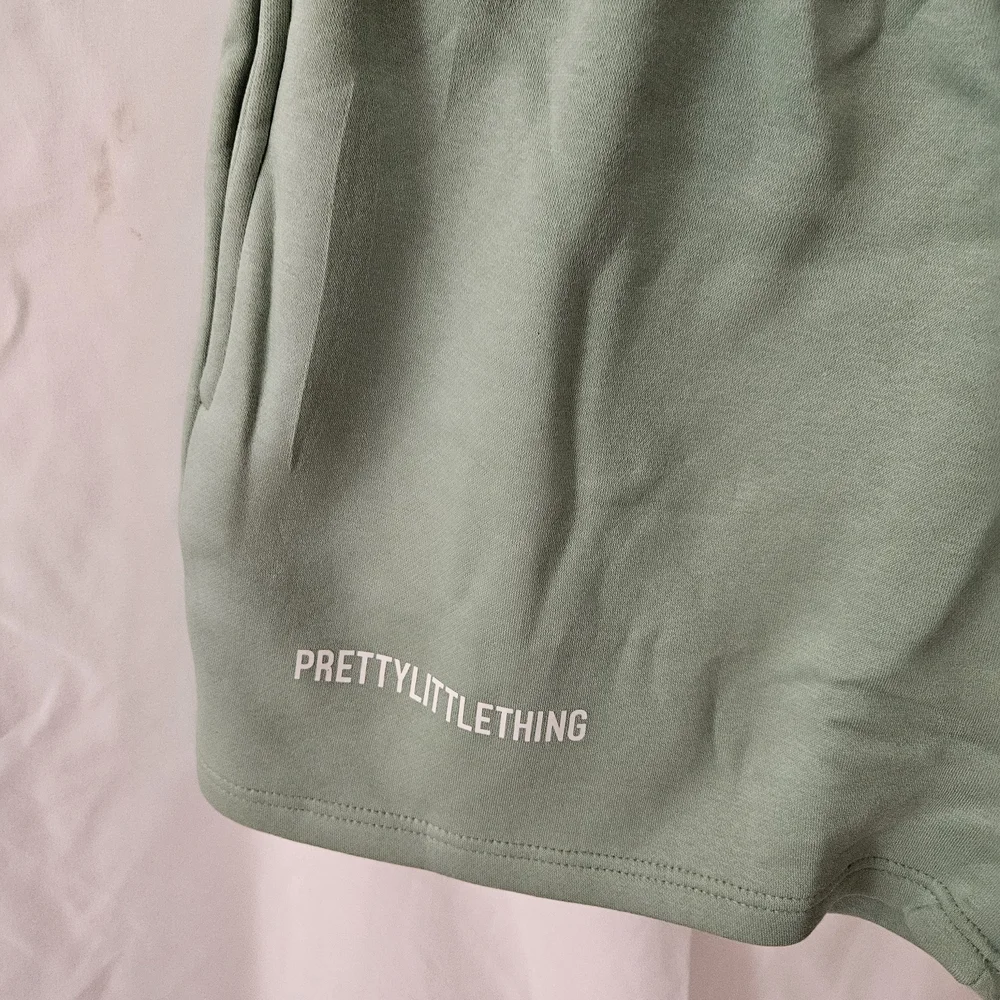 #135 PrettyLittleThing Sage Green Athletic Shorts - Picture 2 of 2